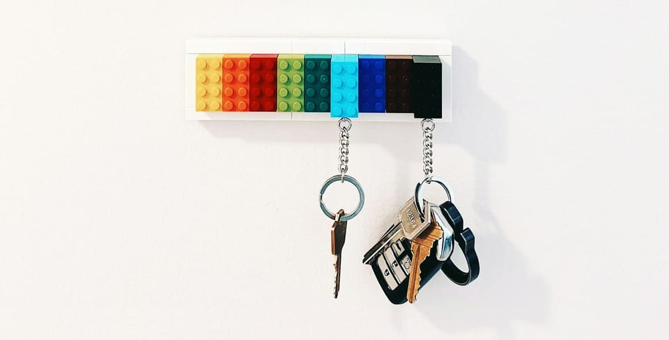 Keys hanging from a lego key hook